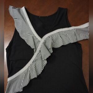 Black and white blouse with ruffles